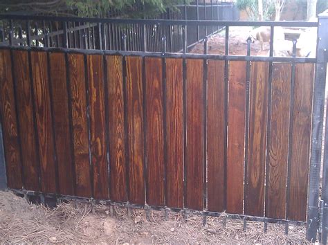 DIY Privacy Fence: Add Stained Wood Pickets to Your Existing Fence