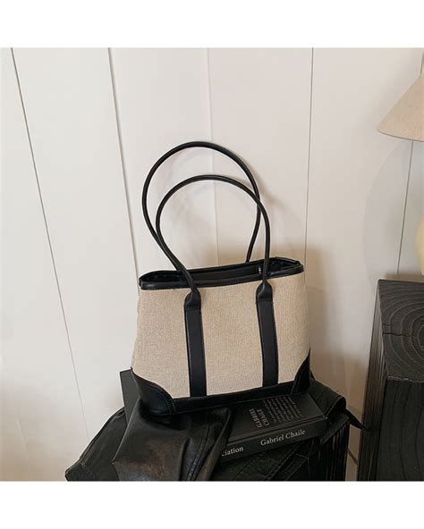 Elysian Edge – Canvas Leather Contrast Tote – Sukha