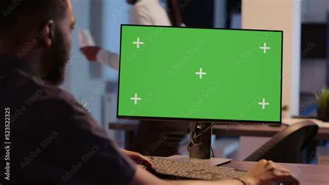 Man Looking at Computer Greenscreen 的图像结果