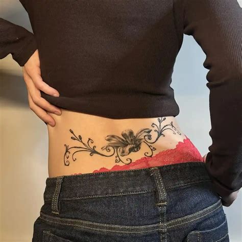 21 Best Lower Back Tattoo Ideas For Women (With Meaning And Style) - Beardlong