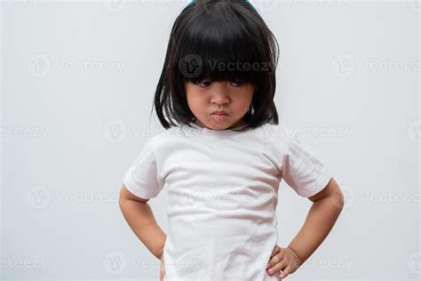 Portrait of Asian angry and sad little girl on white isolated ...