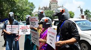 IN PHOTOS PETA members protest in pigeon masks to protest feeding ban