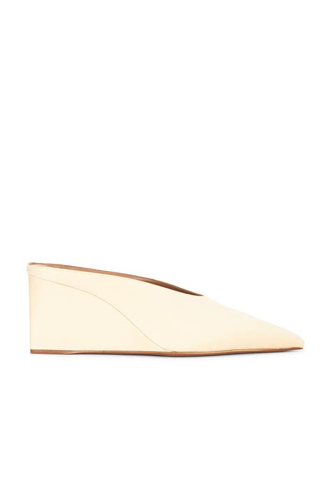 ALAÏA Wedge Mule in Dune | FWRD