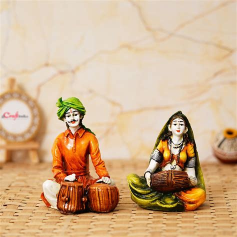 Colorful Combo of Rajasthani Craftsmen and Lady Playing a Musical Inst ...