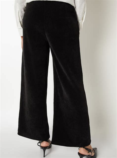 Buy Women Pleated Wide Leg Corduroy Trousers Online at just Rs. 1299.0 ...