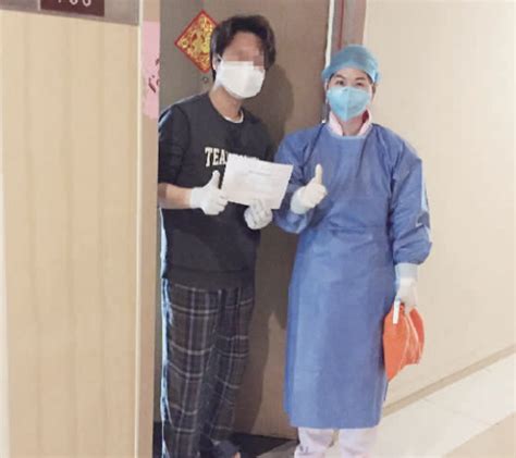 南海新闻网-韩国准爸爸解除居家隔离，隔空拥抱医护人员