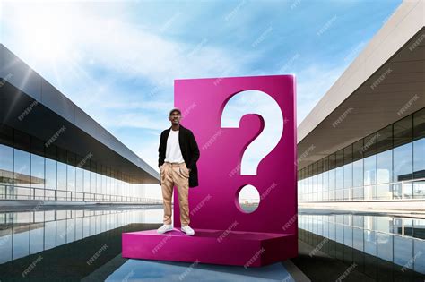 Premium Photo | Full shot man posing with question mark