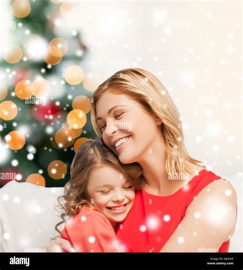 hugging mother and daughter Stock Photo - Alamy