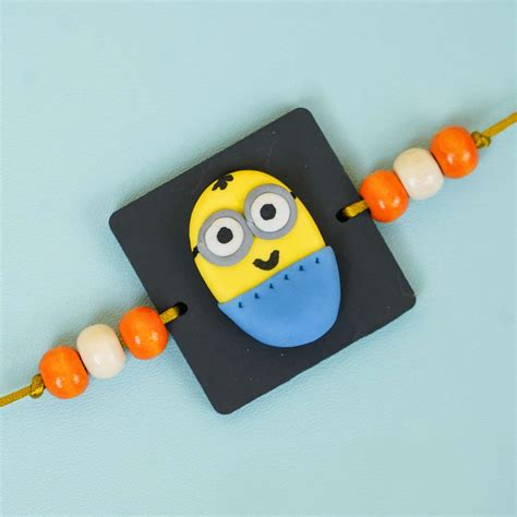 Buy Handmade Miniature Clay Minion Kids Rakhi With Roli Chawal Online ...