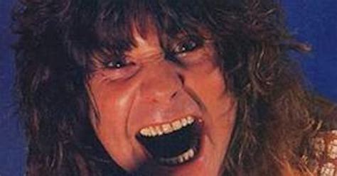 Ozzy Osbourne biting a bat on stage in 1982