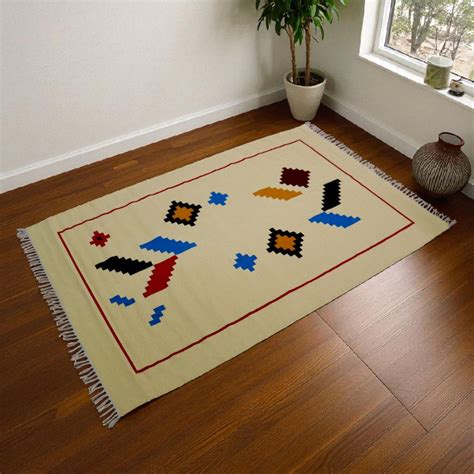 Dhaaga Weaves | Indian Handloom Handcrafted Dhurries & Cushion Covers