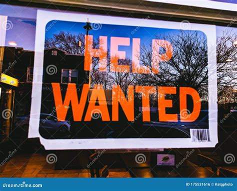 Help Wanted Sign Hanging on Business Window Stock Photo - Image of ...