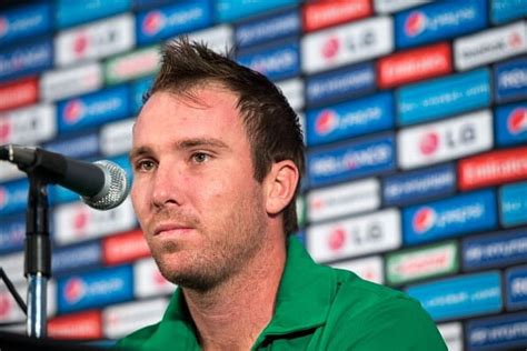 Zimbabwe captain Brendan Taylor apologizes to Ireland's John Mooney