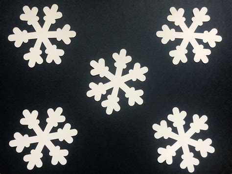 Image result for Snowflake Paper Cut