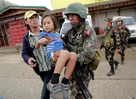 菲律宾战事时间长超预料 武装分子挟平民垂死挣扎-新华网