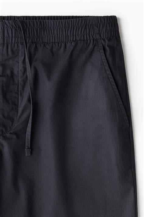 Men’s Navy blue Relaxed Fit Poplin trousers | H&M IN