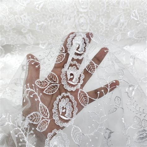 Nora White Floral Lacey Embroidered Net Fabric – Matching Woman