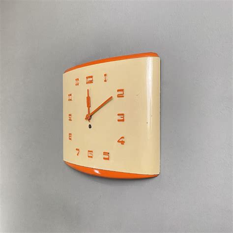 Italian mid-century modern orange and beige rectangular wall clock ...