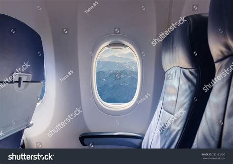 Стоковая фотография 730132150: Empty Seat Airplane Window View Inside ...