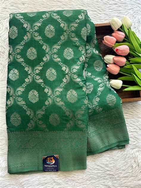 Semi Georgette Saree Green Colored Complemented with a Zari Border ...