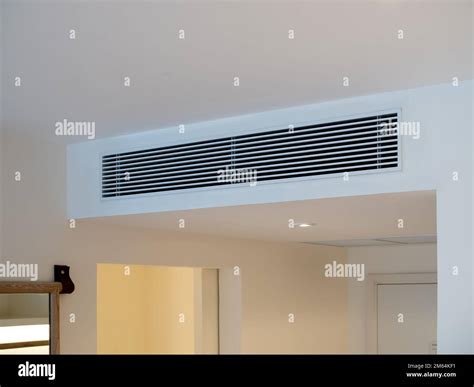 Air conditioning wall mounted ventilation system on ceiling in the ...