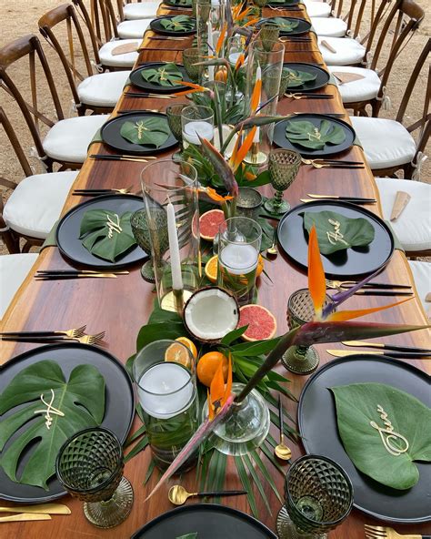 Vibrant tropical table setting by the beach. These tropical wedding ...
