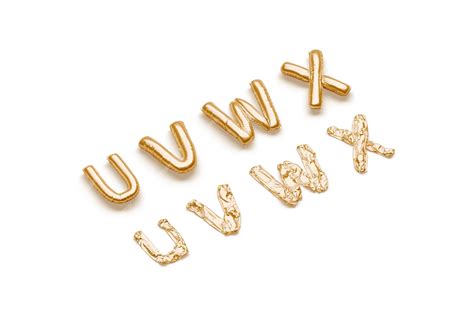 Premium Photo | Inflated deflated gold letters balloon font Golden helium or air decorative ...