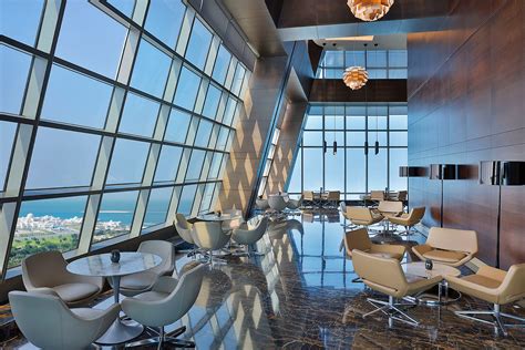 https://visitabudhabi.ae/-/media/project/vad/where-to-go/dining/observation-deck-at-300/auhet---observation-deck---dining-area-01.jpg