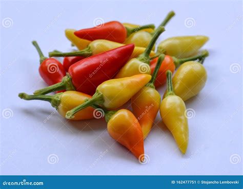 The Yellow, Red and Orange Hot Chili Peppers Stock Image - Image of ...