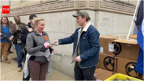 Pro-gun activists hand out free AR-15 magazines outside Virginia State ...
