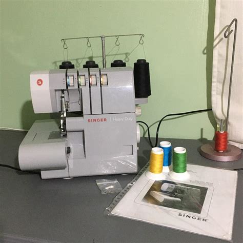 Image result for Singer Overlock Sewing Machine Self Threading