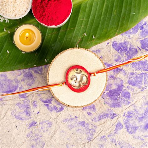 Handpainted Circular Red Om Designer Rakhi Set with Roli & Chawal ...