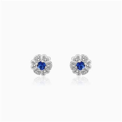 Silver Blue Bloom Studs: Regal Radiance – GIVA