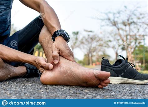Runner Have Bruise Ankle From Sprain Accident Stock Photo - Image of ...