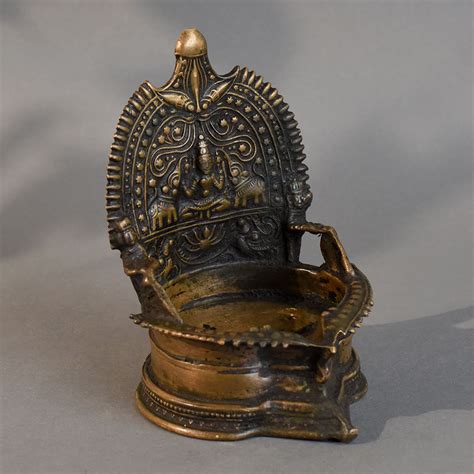 Indianshelf Brass Deity Design Temple Art Diya Antique Finish