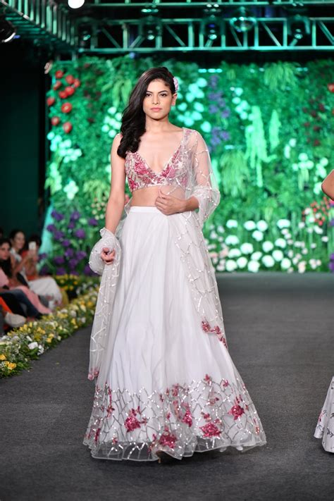 Deep neck rose embellished white lehenga – KASHMIRAA