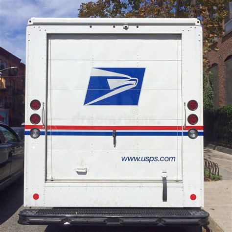 U.S. Postal Service (USPS) trucks are parked at a post office on August 23, 2024 in Glendale, Califo