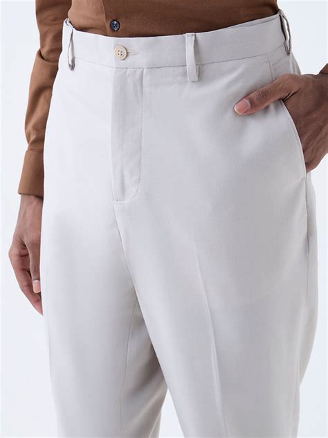 Buy WES Formals Beige Solid Relaxed-Fit Mid-Rise Trousers from Westside