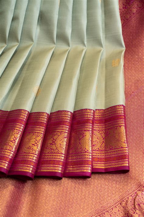 Tea green and red traditional pure Kanchipuram silk saree | Clio Silks