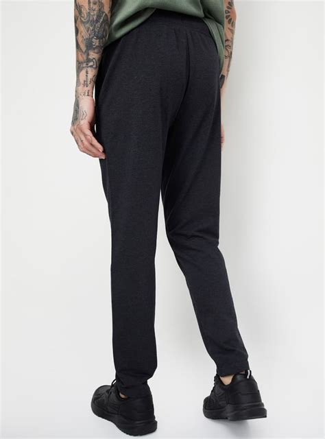 Buy Men Solid Athleisure Track Pants Online at just Rs. 699.0 ...
