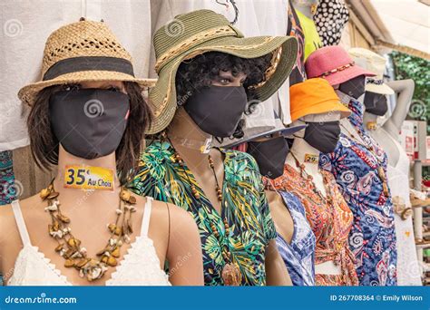 Mannequins Wearing Hats and Face Masks in the South of France ...