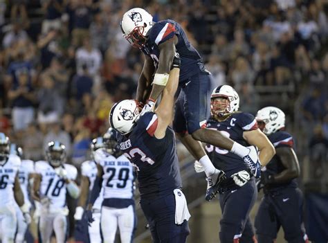 Photos: UConn football defeats Maine