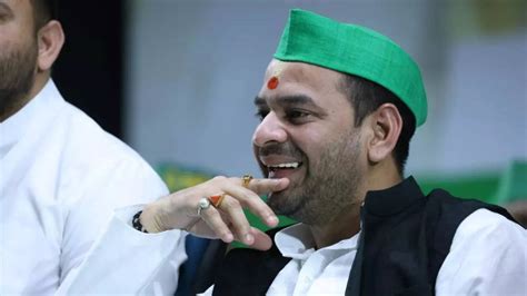 On Holi, Tej Pratap Yadav Asks For 'Paltu Chacha', Rides Scooter Near ...