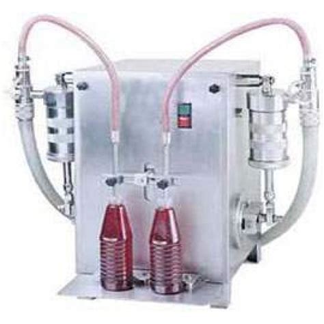 Liquid Filling Machine Manufacturers In Madurai - Navbharati Machinery Co.