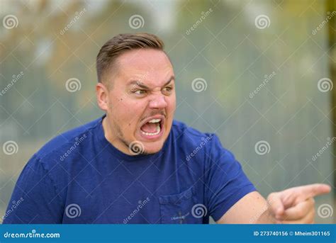 Extremely Angry Aggressive Young Man Stock Photo - Image of blue, yelling: 273740156