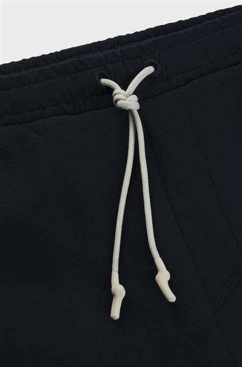 BOSS - Stretch-cotton shorts with embossed artwork - Black