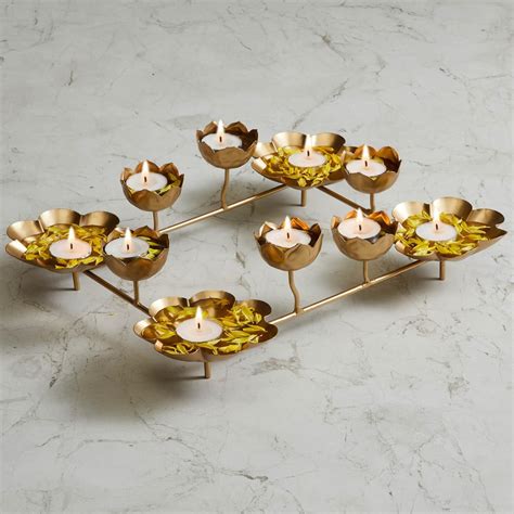 Buy Home Centre Corsica Kamal Set of 10 Lotus T-Light Holder with Metal ...