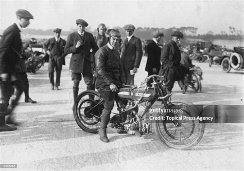 The winner of the Senior Tourist Trophy Race, Kenneth Holden, at a ...