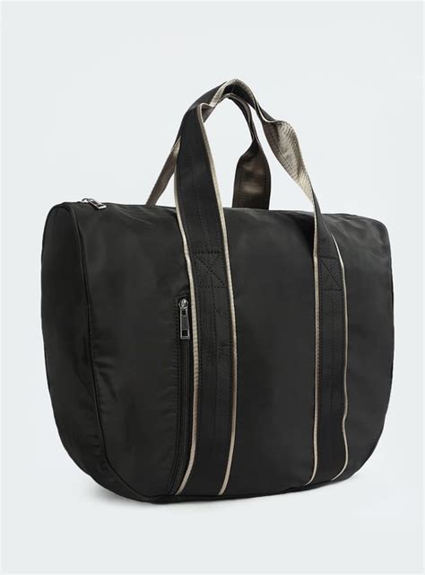 Buy Women Solid Handheld Bag Online at just Rs. 999.0 - 1000014254572 ...