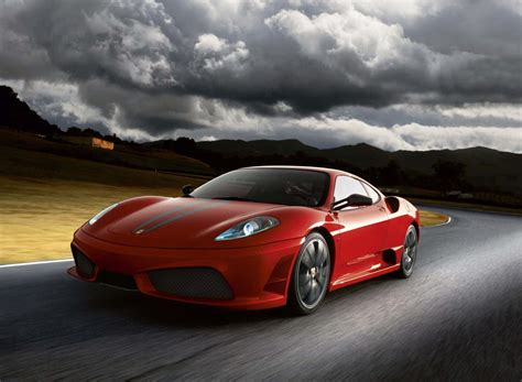 Download Stunning Red Ferrari F430 in Action Wallpaper | Wallpapers.com